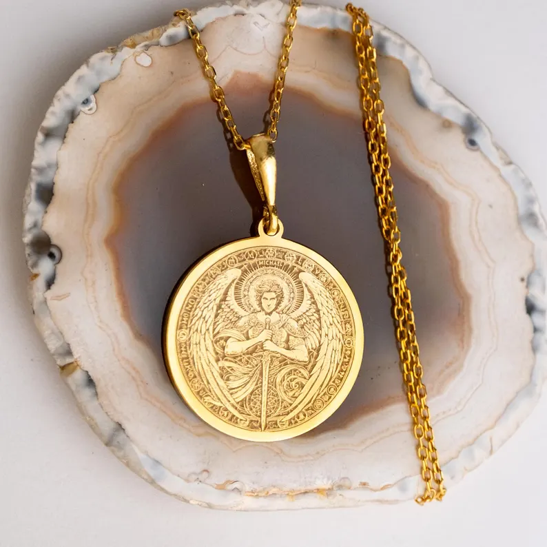Hand-finished gold Archangel medallion with a raised sword motif